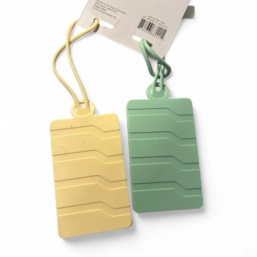 Two NWT Luggage Tags